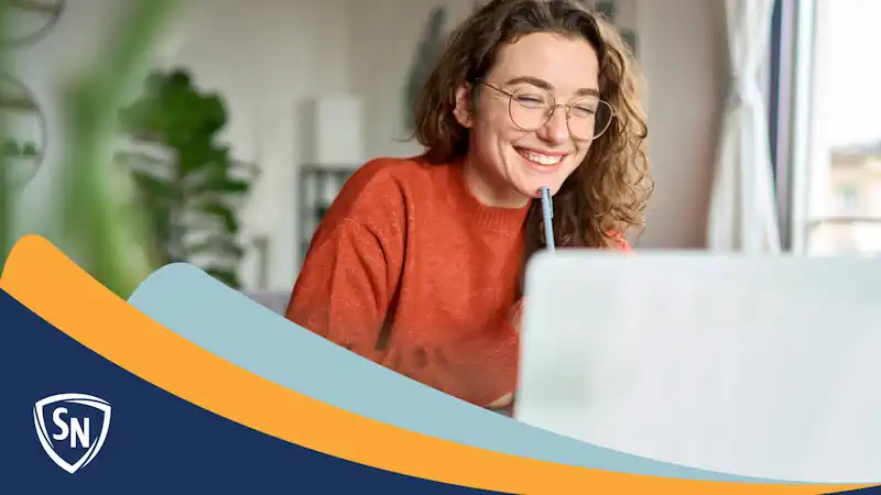 woman taking business classes online