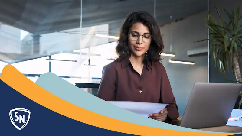 woman working on her computer in a modern office